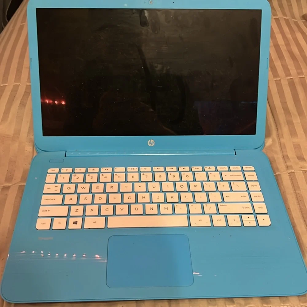 HP Blue Laptop with Matte Finish and Compact Design  BTW NEEDS NEW CABLE CHARGER
